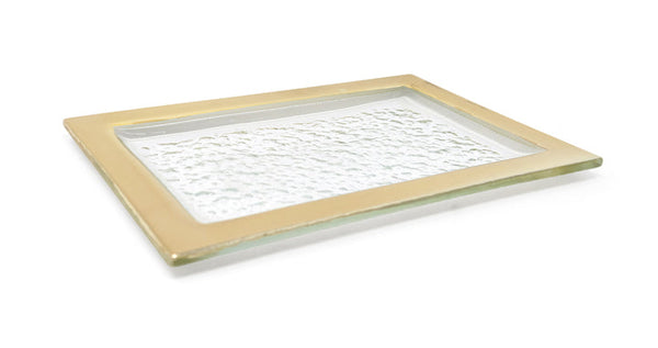 A rectangular glass serving tray with a textured surface and a gold-tone border. The elegant design combines a clear glass center with a metallic frame, making it ideal for serving appetizers, desserts, or decorative use.