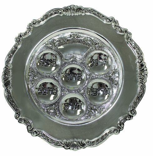 A silver-plated Passover Seder plate featuring an ornate floral border and six engraved indentations for the symbolic Seder items.