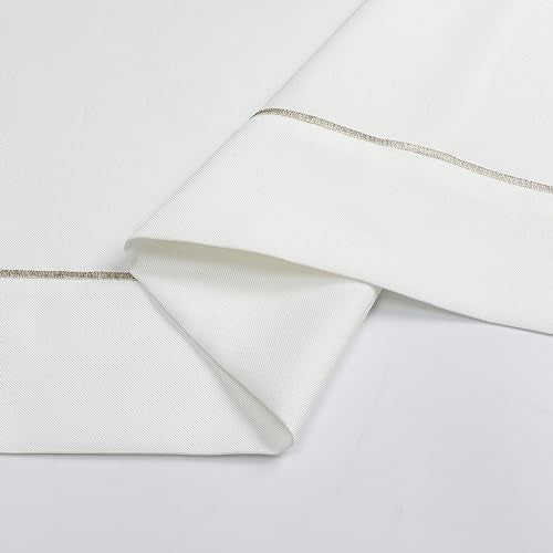 A detailed view of the tablecloth’s hemmed edge, displaying its refined silver trim.