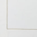 A zoomed-in shot of the silver trim along the tablecloth’s border, highlighting its subtle elegance.