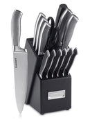 Stainless steel knife set displayed in a black knife block on a countertop