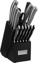 Stainless steel knife set displayed in a black knife block on a countertop