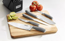 stainless steel knives on a cutting board