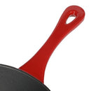 Close-up of the red handle on the Crock Pot enameled skillet