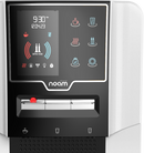 A sleek coffee machine with a touchscreen display showing time, temperature controls, and customizable drink options.