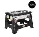 Black folding step stool with a textured top for grip and cut-out handles for easy carrying, labeled as "BLACK" in a circular tag.