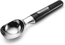 A shiny silver cast-zinc ice cream scoop with a black ergonomic handle.