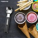 A shiny silver cast-zinc ice cream scoop with a black ergonomic handle.