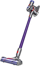 Dyson V8 Animal+ Stick Vacuum standing upright in purple and silver.
