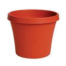 Medium terracotta-colored resin planter with a smooth, rounded rim and traditional tapered shape