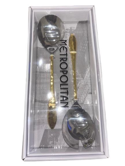Two-piece gold and silver salad serving set with elegant handles in a clear-lid gift box labeled “Metropolitan”