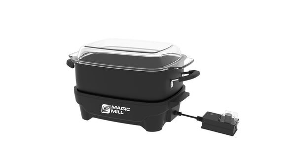 Black Magic Mill 6.5 quart slow cooker with clear flat glass lid, side handles, and temperature control knob