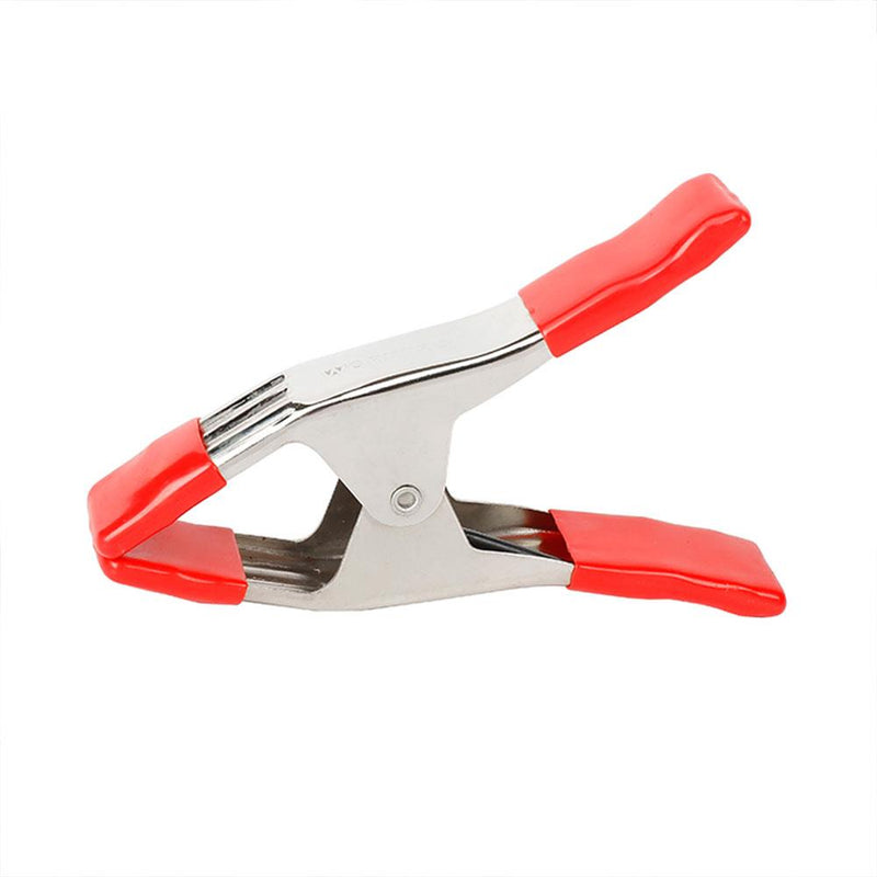Metal spring clamp with red PVC-coated handles and jaw tips, designed for secure grip and easy handling during clamping tasks.