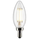 Clear LED chandelier bulb lit with soft warm glow