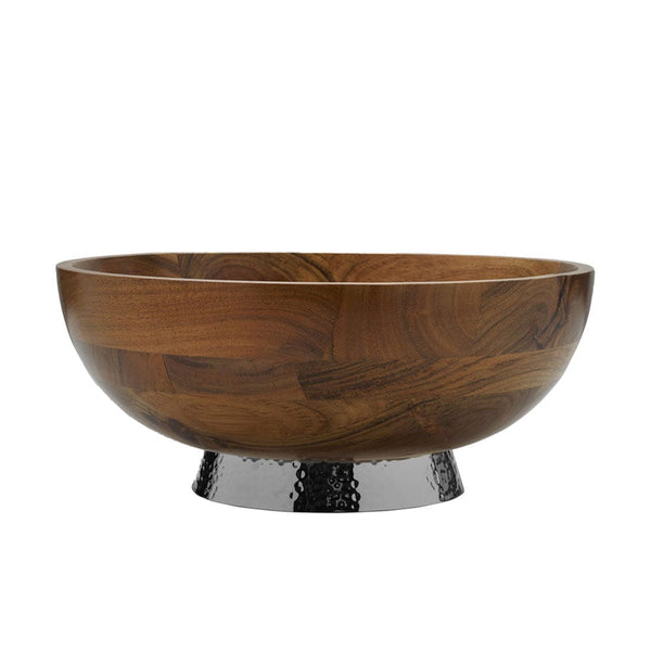 Round wooden serving bowl resting on a contrasting silver hammered base