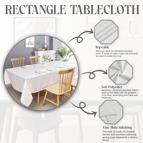 Silver diamond-patterned jacquard polyester tablecloth elegantly draped over a long dining table