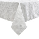 Elegant silver damask tablecloth hanging from a table edge