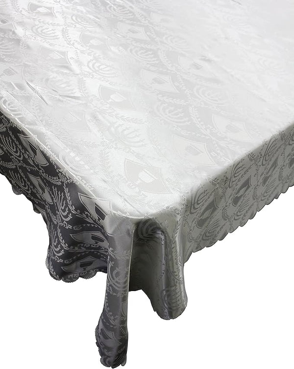 White polyester tablecloth with coordinating challah cover set, elegantly arranged for a Shabbat table setting