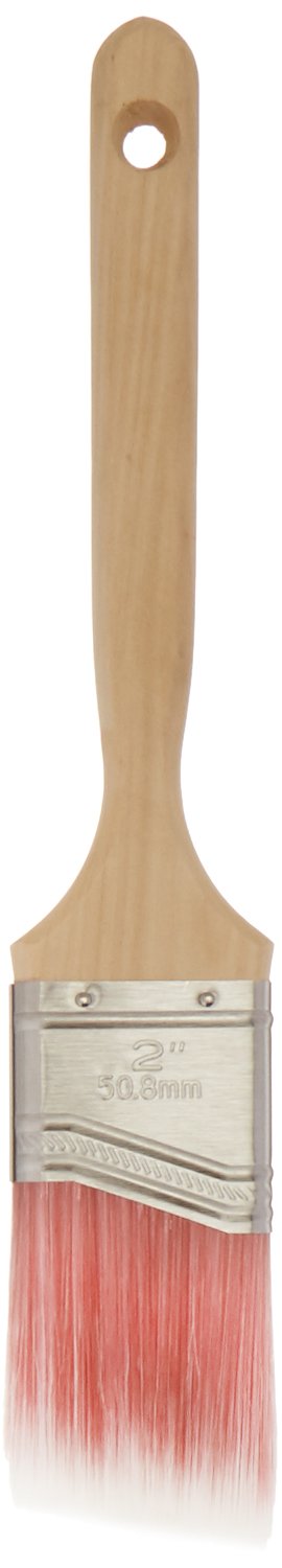 Close-up of 2-inch angular paint brush with natural wooden handle and coral-tipped bristles