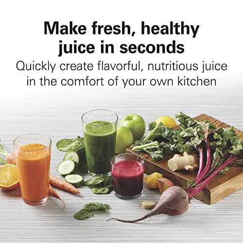 Assorted fresh juices made with Hamilton Beach juicer next to fruits and vegetables