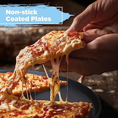 Close-up of cheesy pizza slice being lifted off the hot plate