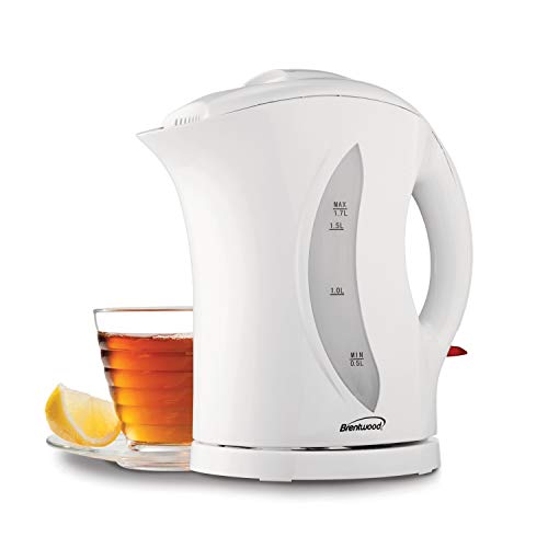 Kettle shown with a glass of tea and lemon for serving inspiration