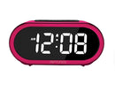 Front view of pink digital alarm clock 