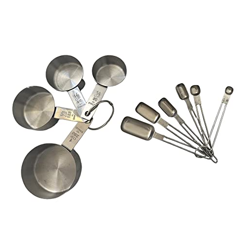 Stainless steel measuring cup and spoon set on white background