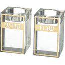 Pair of crystal candlesticks with gold Hebrew plaques reading "Shabbat" and "Kodesh"