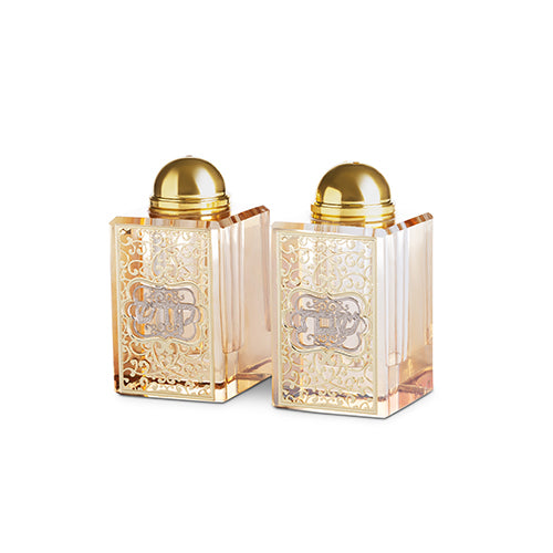 Pair of crystal salt and pepper shakers with gold plaques and domed gold tops