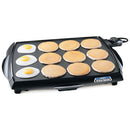 Large 19x15-inch Presto Tilt ’n Drain Big Cool Touch Electric Griddle cooking pancakes and eggs