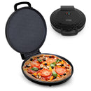 Courant 12-inch Pizza Maker with open lid showing freshly baked pizza.