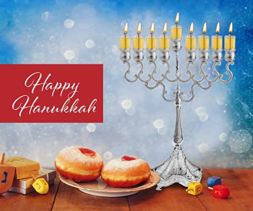 Festive Hanukkah setup with menorah, sufganiyot, and dreidels beside a “Happy Hanukkah” card.