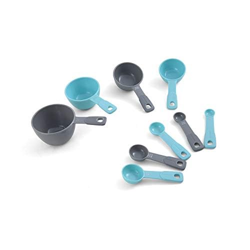 Farberware measuring cups and spoons arranged on a white surface in matching aqua and gray colors.