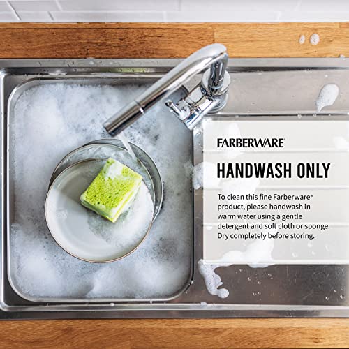 Handwashing a Farberware bamboo cutting board in a sink.