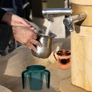 Handwashing setup featuring the Majestic stainless steel cup and other wash cups.