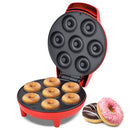 Red Courant mini donut maker open with seven mini donuts baking inside.