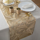 A decorative beige table runner by Home Details, showcasing a delicate rope-inspired laser-cut pattern.