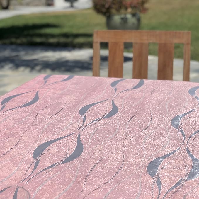 Pink Pearl tablecloth elegantly spread over a large dining table, highlighting its scalloped edges and jacquard texture.