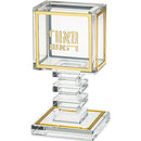 Clear acrylic Havdalah candle holder with gold trim and Hebrew lettering on a stepped base