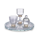 Clear crystal Havdalah set with spice box, candle holder, and cup arranged on a round tray