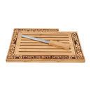 Wooden challah tray with engraved border and matching serrated knife