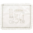White satin challah cover with embroidered Shabbat design, decorative fringe border, and Hebrew lettering