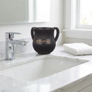 Black polymer washing cup with dual handles and gold Hebrew lettering on the front