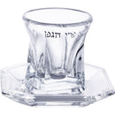 Crystal kiddush cup with a saucer ib in on a white background.