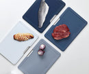 Small Folio plastic cutting board set with four color-coded boards in a slimline case, displayed on a white background.