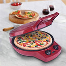 Red electric pizza maker with a cooked pizza inside, lid open, and controls visible.