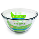 Clear 4-quart glass mixing bowl with smooth round shape on a white background.