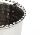A close up of the kiddush cup's beaded detailing.