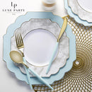 Ice blue gold scalloped plastic plates.